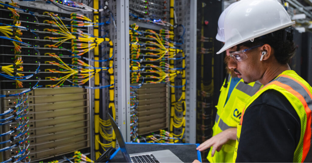 CoreWeave technicians at a data-center deployment site